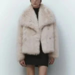 Elegant beige faux fur coat for women, stylish and warm.