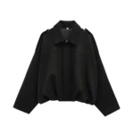 Oversized black jacket with shoulder epaulets, casual streetwear style.